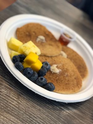 Pancakes with fruit  at The Pureganic Cafe in Harrison