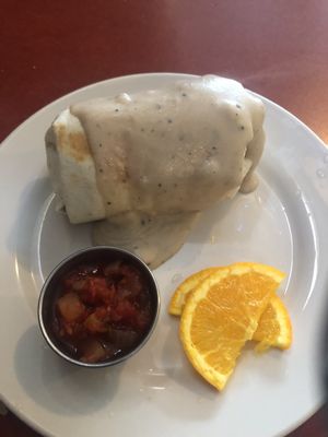 Breakfast burrito smothered in gravy at Flora Kitchenette in Louisville