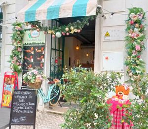 Teddy the bear having a sweet meal at O Canteiro in Setubal