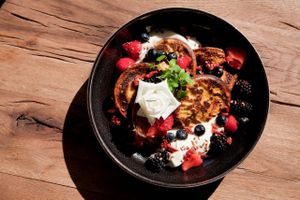 Pancakes with goji berries, lime, fruit and flax seed at Cafe Sage in Amsterdam