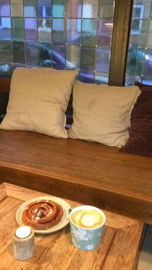 Cinnamon pastry and oat milk latte at Det Rene Brød - Kronprinsessegade in Copenhagen