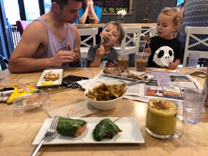 Collard wrapped shiitake teriyaki burger, poutine, turmeric latte, gluten-free waffle, avocado toast, chocolate smoothie.  at Copper Branch in Brooklin