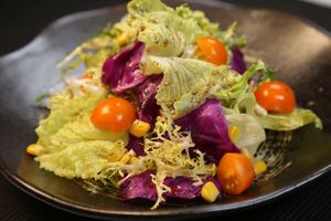 Salad with olive vinegar oil at Old Wood Village in Dubai