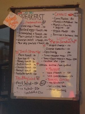 Menu board at Grasswood Cafe in Udaipur