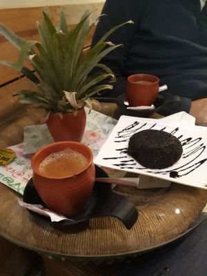 Chocolate cake and massala tea with soy milk at Grasswood Cafe in Udaipur