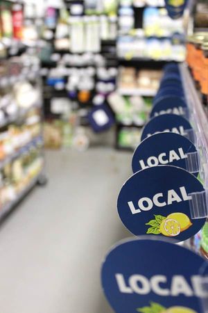 Anything made within 50 miles of our store has a blue "local" circle in front of it.  at Lemon Street Market in Lancaster