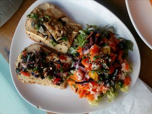 hummus toast with salad at Vege Cafe in Lausanne