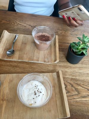 Chocolate mousse and apple crumble with whipped cream at Vege Cafe in Lausanne