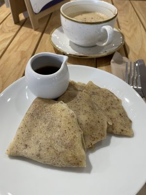 Pancakes with maple syrup (accidentally gluten free; the brown bits are flax seed)  at Sheaf Street Health Store in Daventry