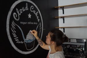 Aelita Co-Founder, drawing our logo on the wall !  at Cloud Cakes - Mandar in Paris