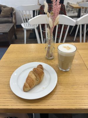 Iced latte and a croissant 🥐   at Cloud Cakes - Mandar in Paris