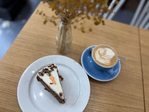 The carrot cake is amazing, very moist and sweet (but not too sweet). I loved the little carrots on top with rosemary as carrotgreens. The atmosphere is very relaxed.  at Cloud Cakes - Mandar in Paris