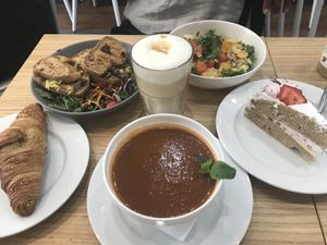 Gazpacho, grilled cheese, salad, latte, cake, croissant  at Cloud Cakes - Mandar in Paris