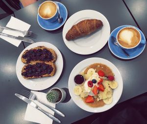 Vegan croissant, peanut butter and jam toasts and pancakes & two soya cappuccinos. Everything to share between 2. Delicious and more than enough. at Cloud Cakes - Mandar in Paris