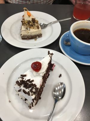 Dessert of carrot cake and black forest cake slices at Cloud Cakes - Mandar in Paris