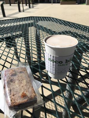 Locally made banana bread and peanut butter hot chocolate made with macadamia milk at Coco Bean Coffee Shop & Cafe in Chapel Hill