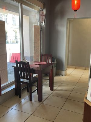 Basic, take away place. Paper plates and plastic utensils    at Pekin Bar in Sopot