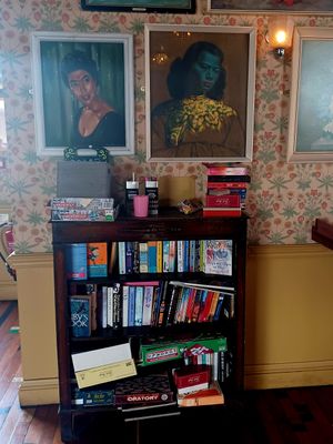 Books and games at Estero Lounge in Monmouth