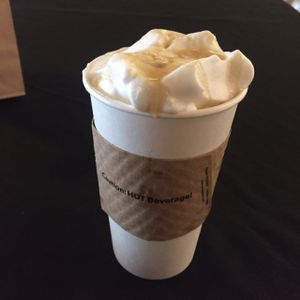 latte w/ aquafaba whipped cream & caramel sauce ! at The Breakfast Club in Lawrence