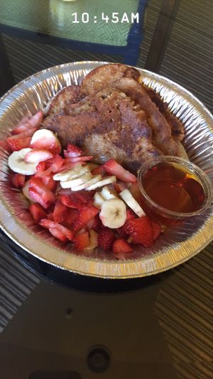 Waffle batter french toast with fresh fruit at The Breakfast Club in Lawrence