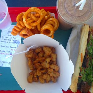 Orange chicken, banh mi, curly fries, and a chocolate shake at VegeWay in Las Vegas
