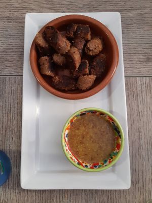 Tapas galore: longaniza (another frame) at El Perro Gamberro in Madrid