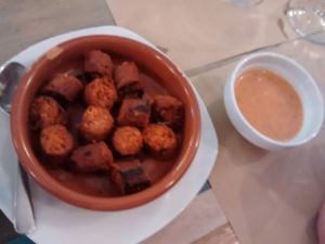 Tapa de chorizo a la parrilla con salsa chimichurri at El Perro Gamberro in Madrid