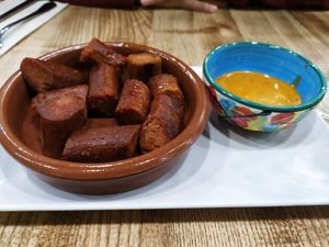 Chorizo vegano con chumichurri at El Perro Gamberro in Madrid