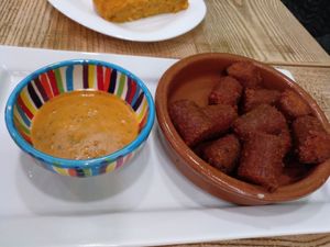Vegan chorizo with chimuchurri sauce at El Perro Gamberro in Madrid