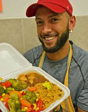 Gibrant and the vegan veggie platter. at Pilar Caribbean in Millville