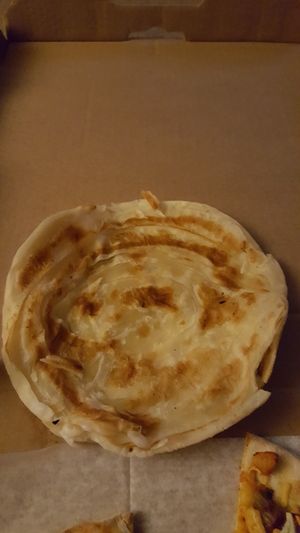 Vegan alternative to naan called paratha.  Super flaky! at Manjal Indian Fusion in Fair Lawn