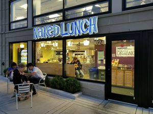 with Happycow sticker at Naked Lunch in Arlington