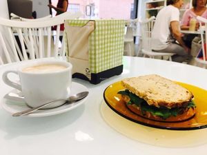 White coffee and spinach sandwich at Sweet Paradise in Tenerife