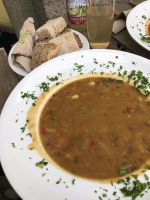 very full plate of yummy bean-minestrone, organic lemonade and bread 😄 at Bio im Bahnhof in Goerlitz