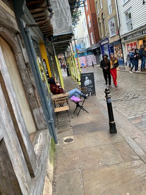 Outdoor seats on pedestrian street at Burgate Coffee House in Canterbury