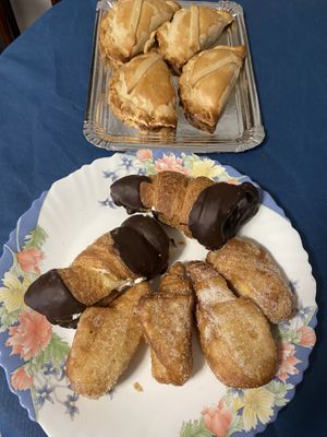 Empanadillas de pisto, susus de crema y caracolas de nata y chocolate  at Panaderia Los Manchegos in Valencia