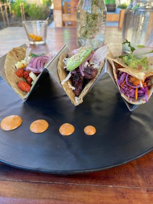 Assorted vegan tacos: hibiscus, plant based cheese and pastor.  at Marcial by Mako in Cabo San Lucas