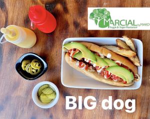 BIG dog
Chorizo, onion and mushrooms au gratin in cheese, fresh tomato and onion, ketchup, cream and avocado slices.
• Accompanied by pickles and baked potato wedges. at Marcial by Mako in Cabo San Lucas