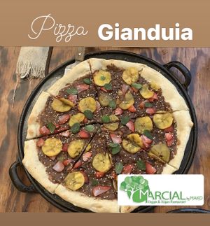 GIANDUIA Hazelnut and chocolate paste, strawberries, flambéed bananas with mezcal, toasted sesame seeds and fresh mint. at Marcial by Mako in Cabo San Lucas