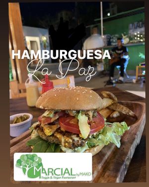 LA PAZ burger
Milanese with lentils, cheese, pineapple chutney, caramelized onion, chilorio, tofu with turmeric, avocado, mixed leaves, tomato and smoked chili dressing. at Marcial by Mako in Cabo San Lucas