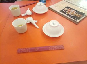 table setting with free tea at An Phuc Chay Tinh Ngiep in Ba Dinh