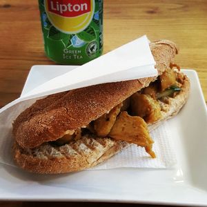 Curried 'chicken' sandwich with pickled cucumber at De Kade in Rotterdam