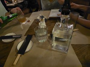 served my water in a vodka bottle. Loved this!  at Happy Banana in 