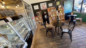 Cool Ⓥ sweat jackets and mugs here  at The Workshop Vegetarian Cafe in North Vancouver