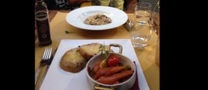 Mains- a risotto and a roasted vegetable dish at Cantine Bernardini in Lucca