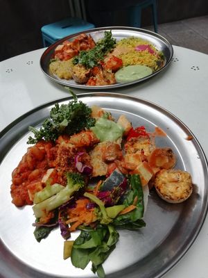Plate closest 11 dollars, other 14 at OM Vegan Kitchen in Surry Hills