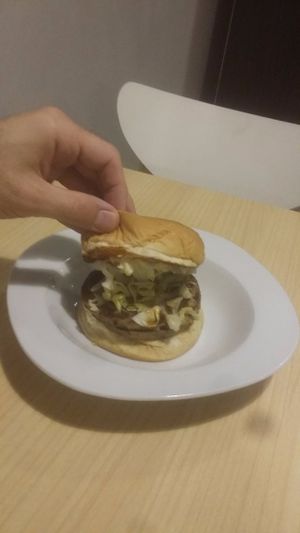 Bread, meat analogue and a couple of pieces of lettuce. And cold bread. Cannot make this up :) at Veggielicious Cafe in Penang
