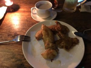 vegan Masala tea with homemade coconut milk and banana fritters.  at Sarangi Vegetarian Restaurant in Kathmandu