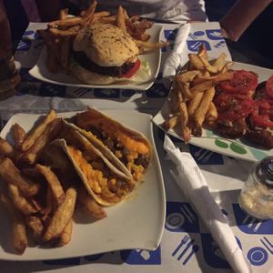 tacos, burger, and schnitzel  at Rocket bar in Buenos Aires