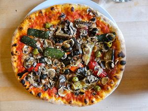 Vegetarian pizza without cheese,  vegan at Beim Olivenbauer in Fuessen